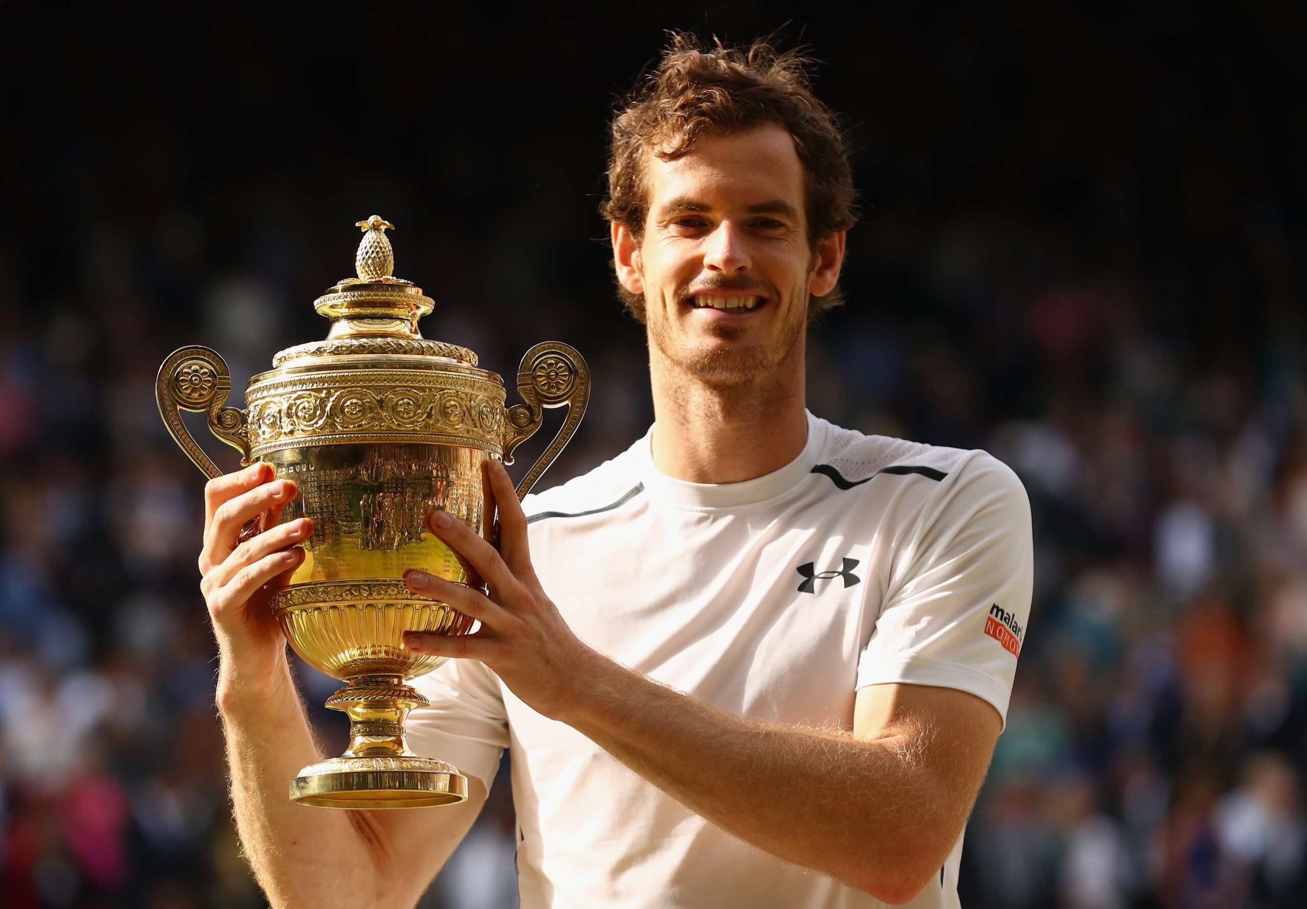 Andy Murray lifting the Wimbledon title scaled