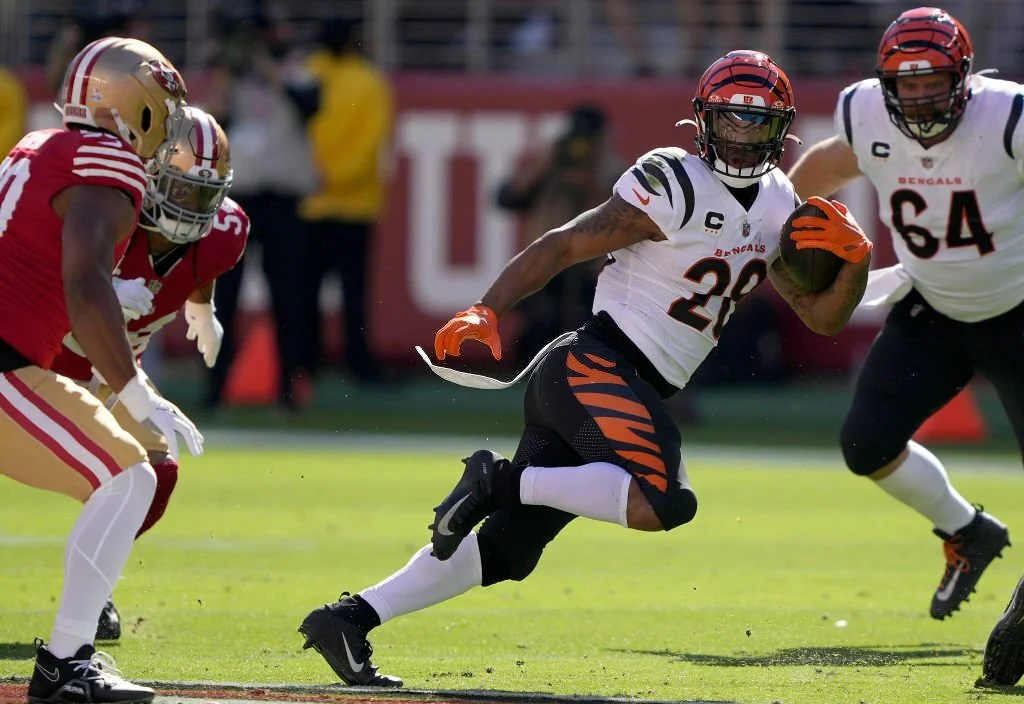 DJ Turner #20 of the Cincinnati Bengals carries the ball against the San Francisco 49ers