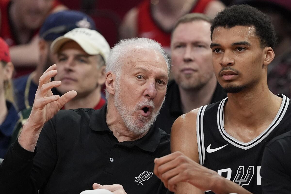 Victor Wembanyama and Gregg Popovich