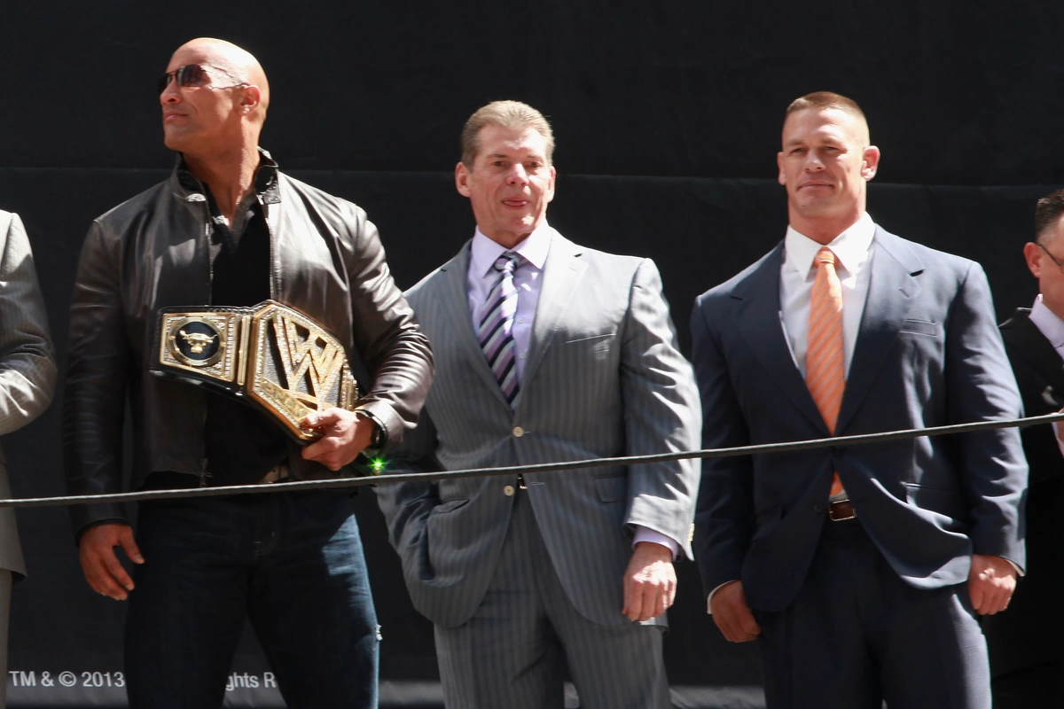 Vince McMahon with The Rock and John Cena